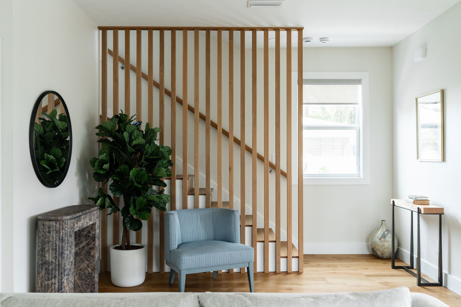 Cozy corner with blue chair and plant