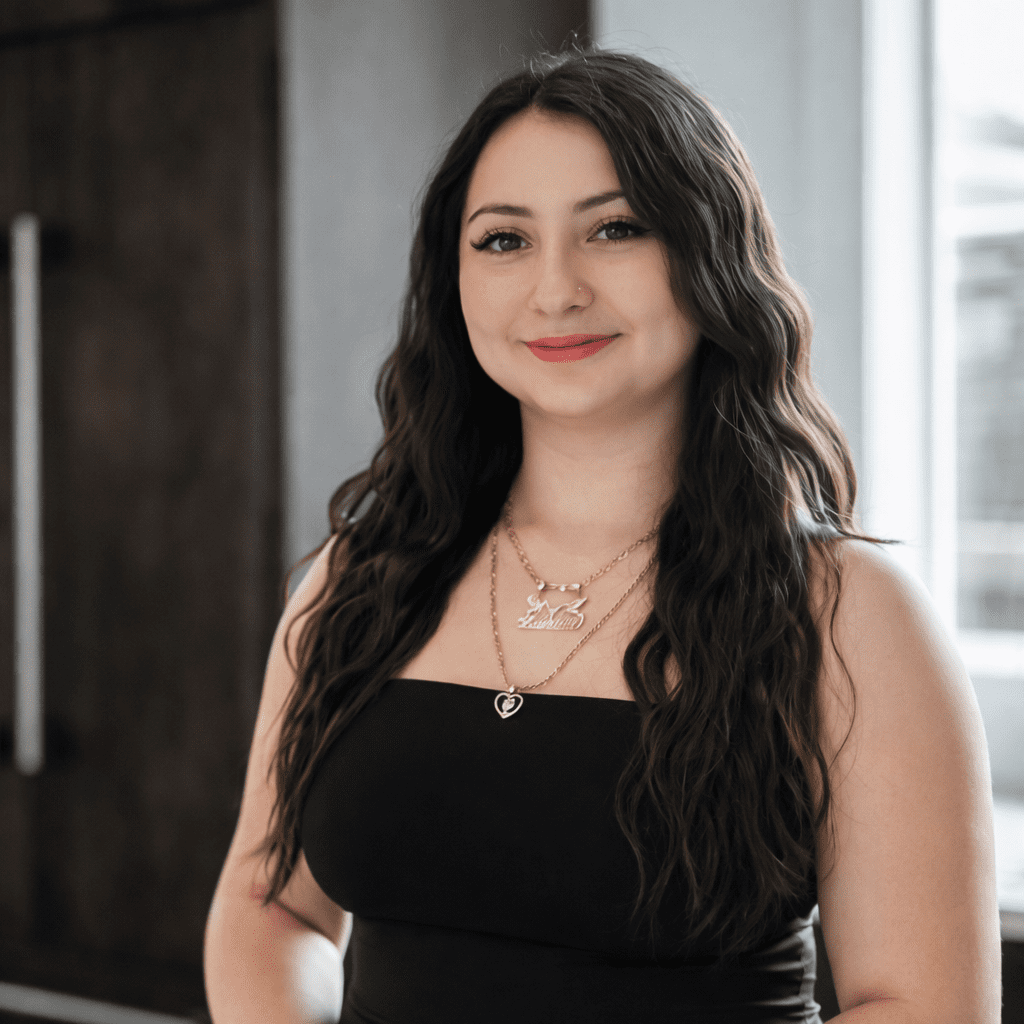 Confident woman standing indoors