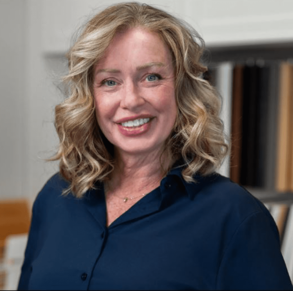 Smiling woman standing indoors